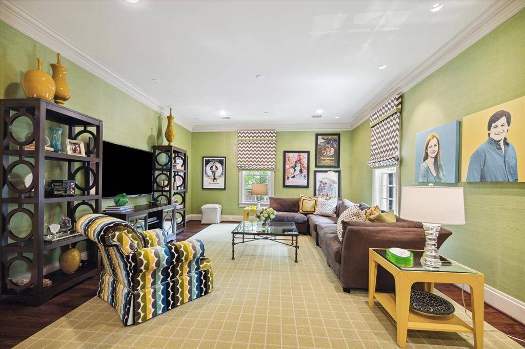 Upstairs tv room and den is close to the back stairway… Another spot for the kids to hangout!