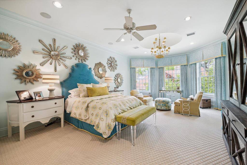 Here’s one of the ensuite bedrooms. All have the finest finishes, including huge walk in closets, custom drapes, chandeliers and special architectural touches.