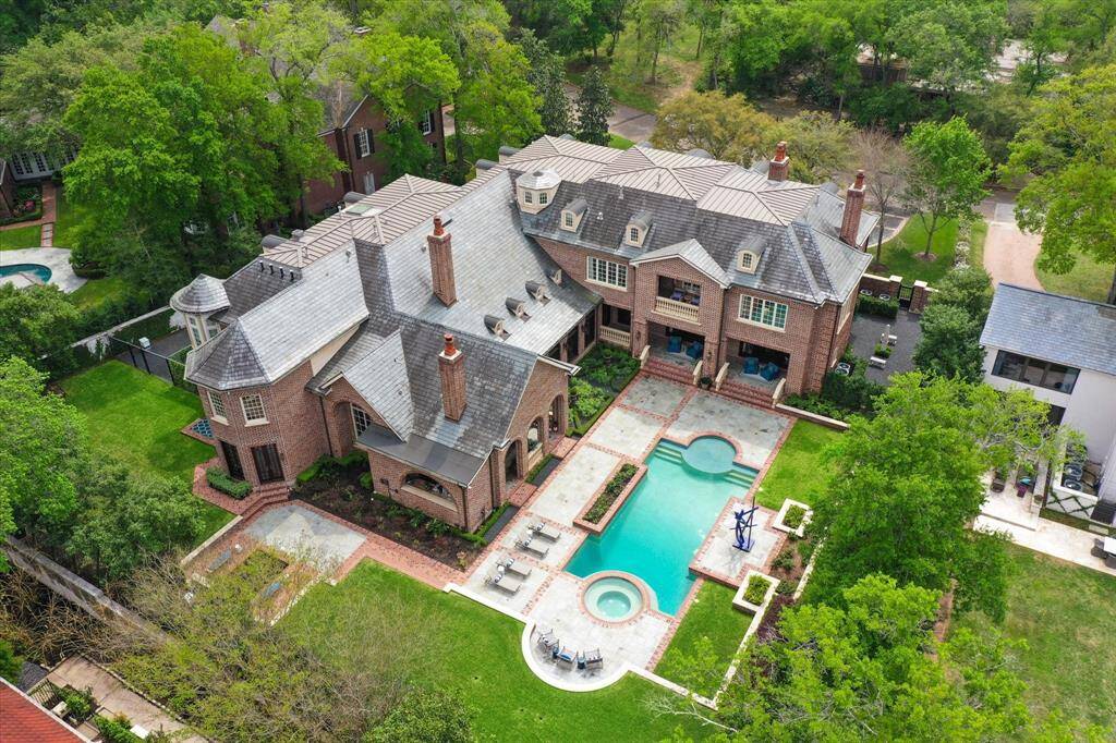 A great view of the expansive 36,000+ square foot lot. The most beautiful “party house” you will ever see. This is also a great shot of the slate roof. Quality abounds and Seller has meticulously maintained.