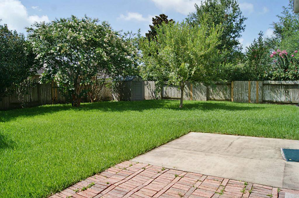 BIG BACK YARD , NICE LANDSCAPING, AND STORAGE SHED