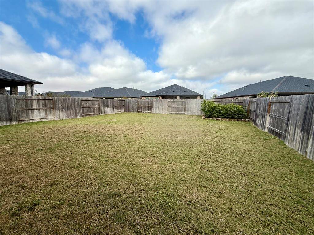 Manicured Backyard – Enjoy the ease of a beautifully maintained yard with lush greenery and plenty of space to unwind.