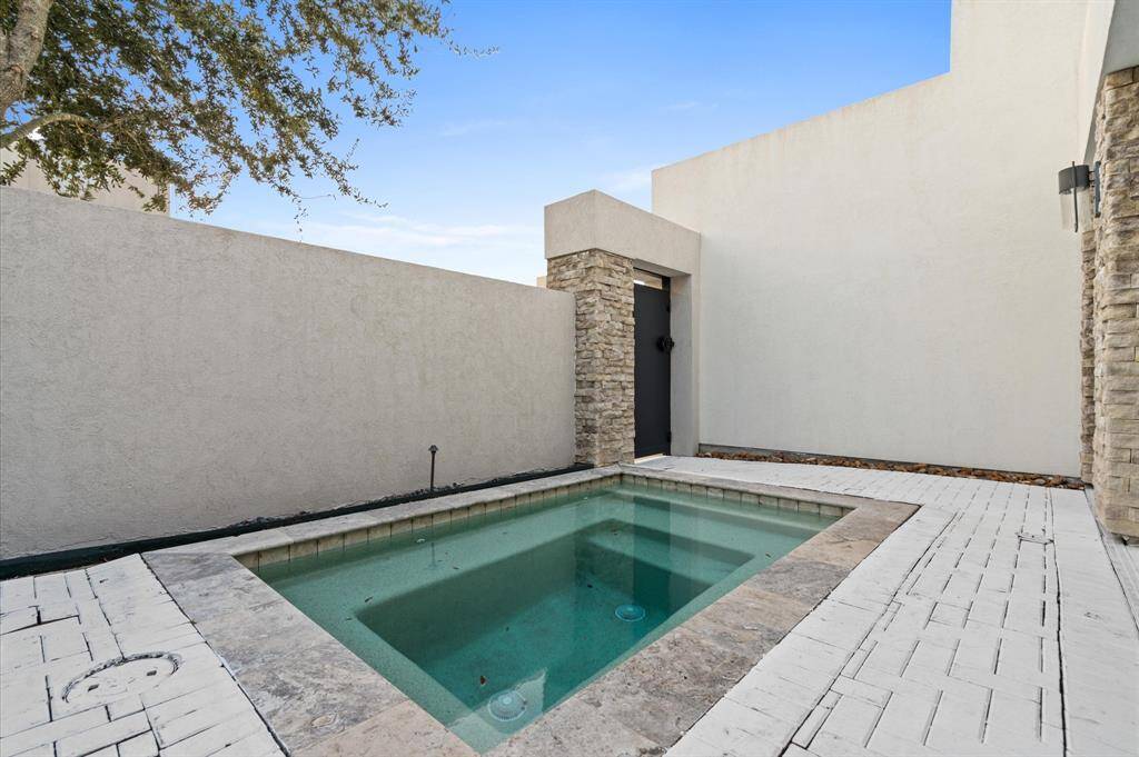 this home features a serene plunge pool, offering a tranquil oasis for relaxation and leisure.