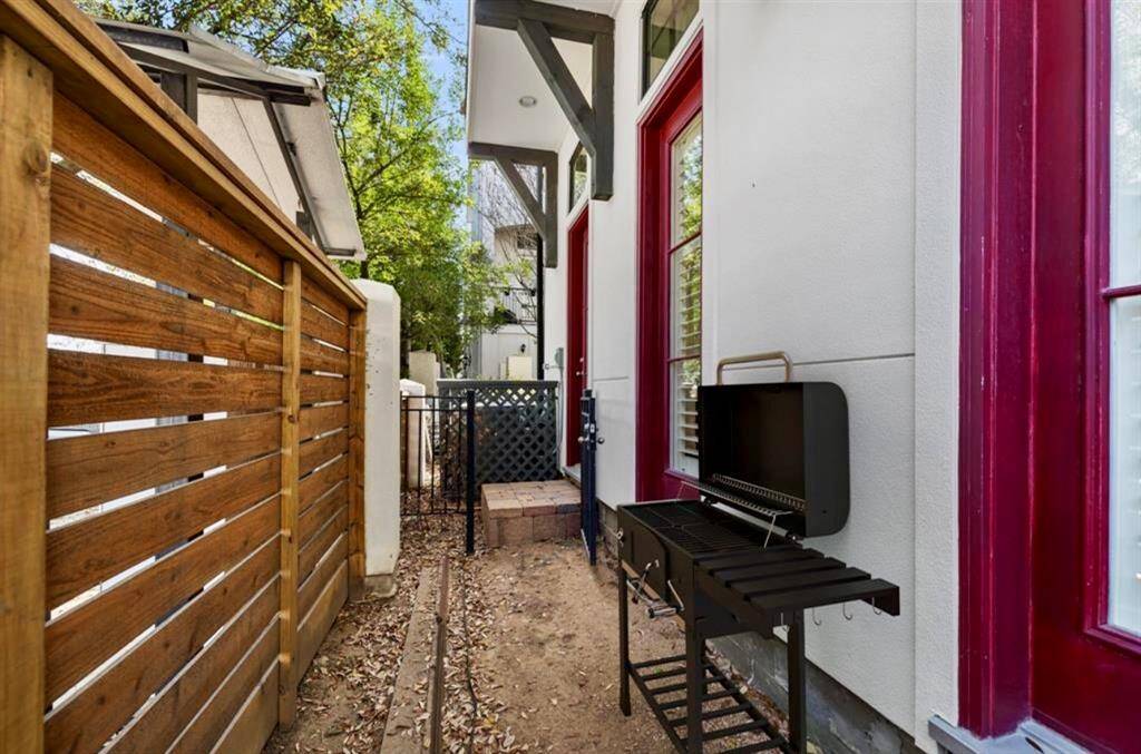 Small side yard (off living & kitchen) is perfect for grilling!