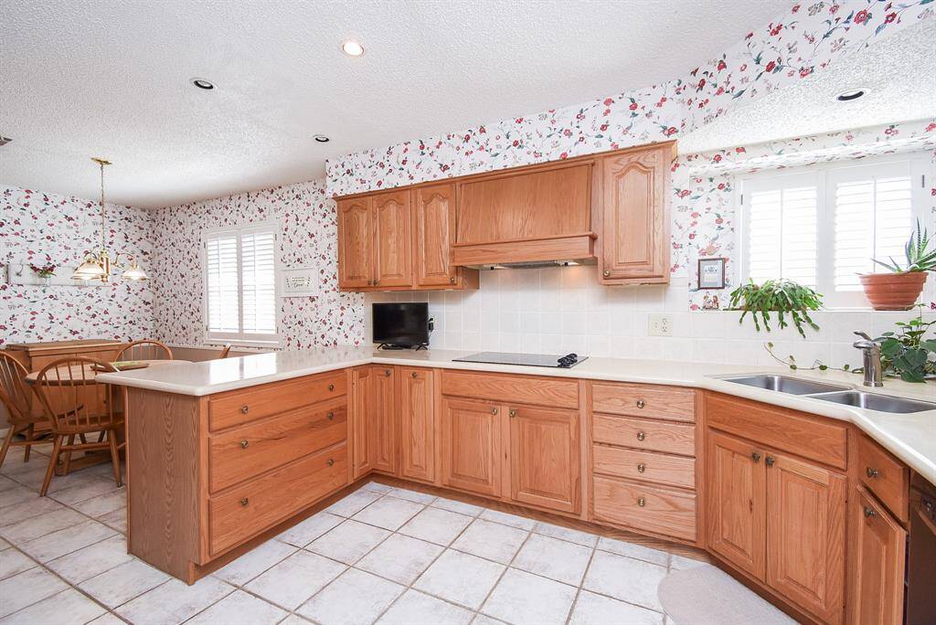 More custom cabinets and drawers. And that kitchen sink window we all love