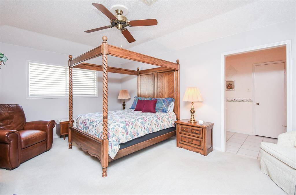 Primary bedroom is in rear of home for extra privacy