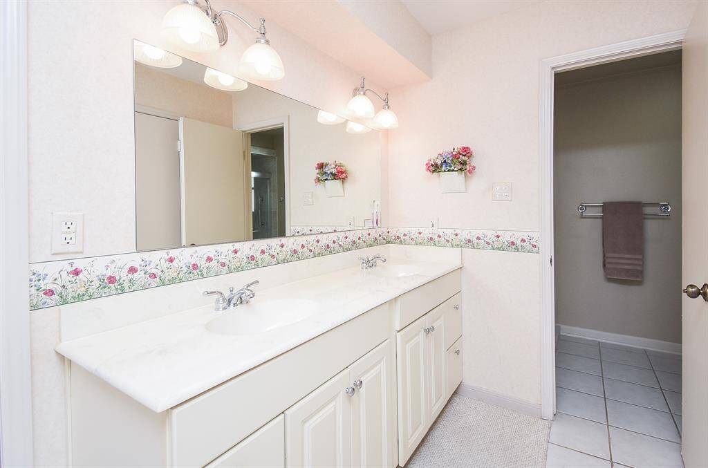 Primary bath with double sinks and private water closet