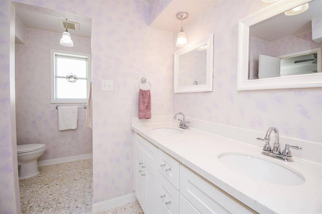 Bathroom 2 with double sinks.