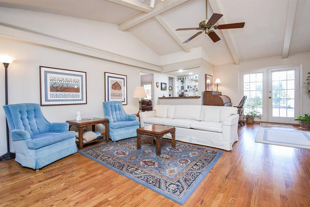 Living room is extra large with high ceiling