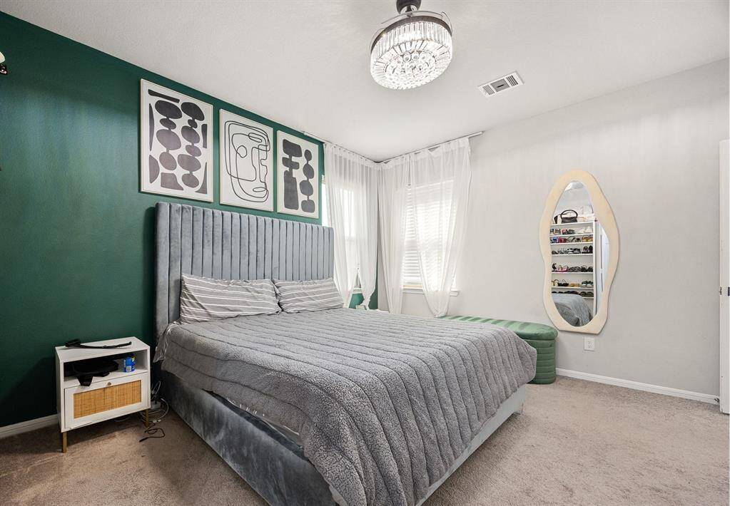 Primary bedroom with natural lighting