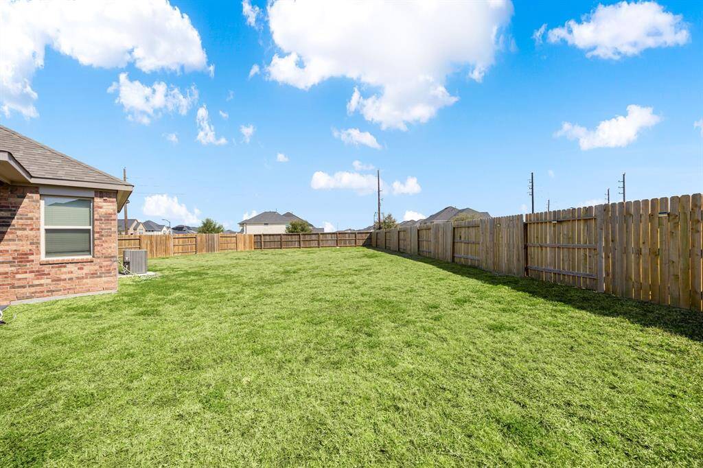 Huge fenced backyard just waiting for you to design your pool, outdoor living center and outdoor kitchen!!