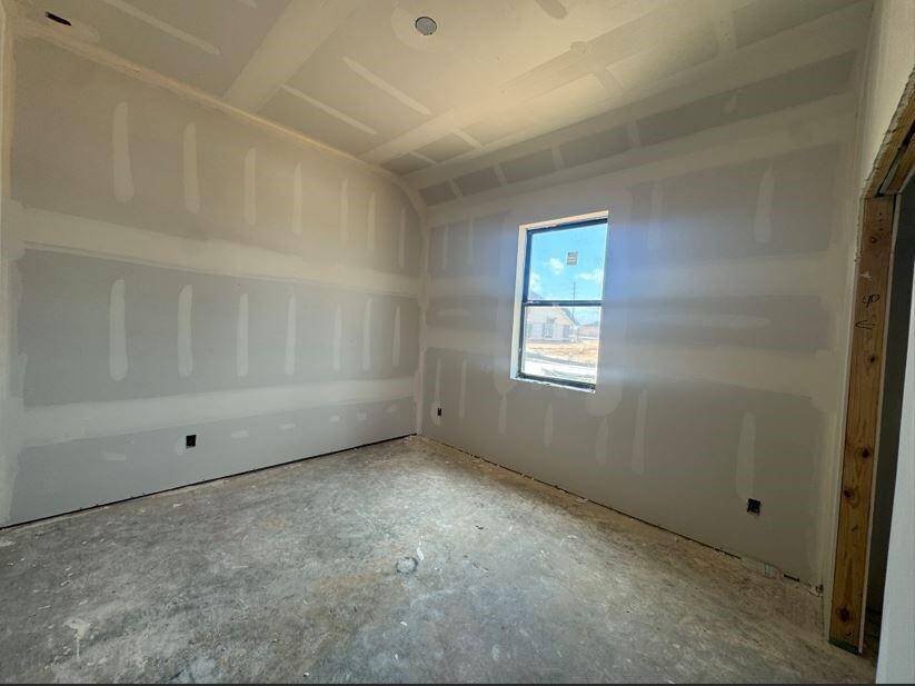 Another spacious secondary bedroom.