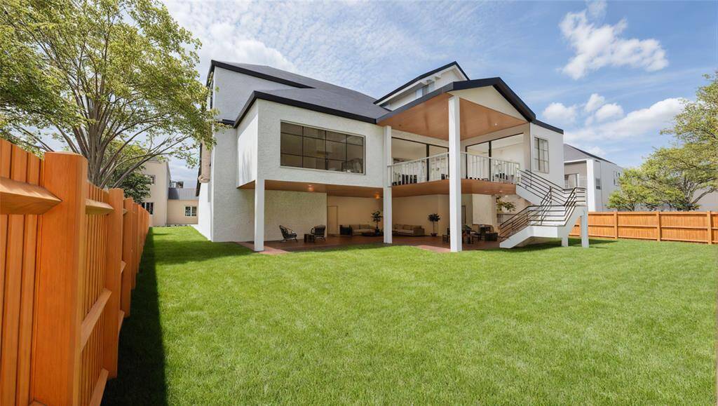 The 1300 plus square feet of covered patio offers a voluminous space under the home for entertaining. Note the yard space and additional 17X15 covered veranda off the family room above.