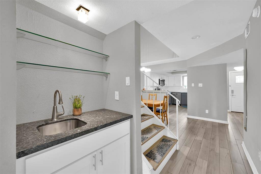 Wet bar on your way to the living room is great for entertaining.