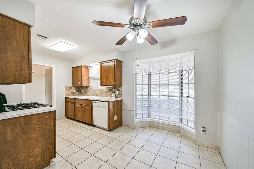 View of the breakfast area and kitchen from living area