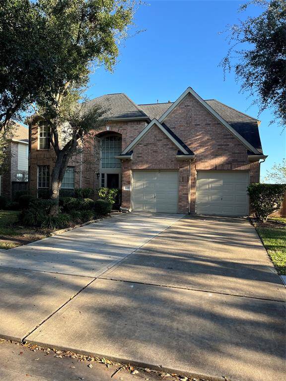 Driveway with 2 Car Garage