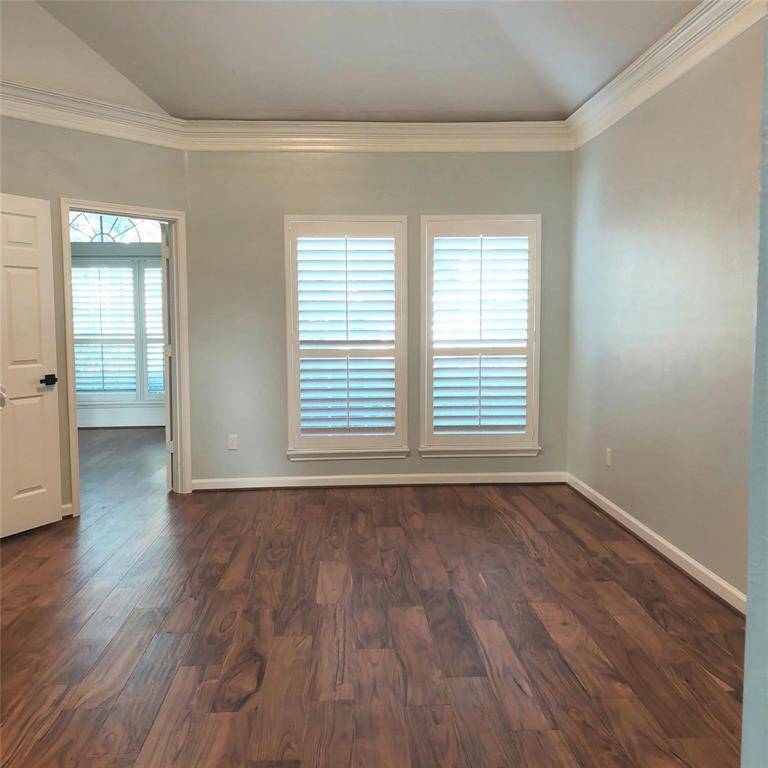 Primary bathroom renovation with new countertops, quartz sinks and countertops, new hardware, new shower, deep-soaking spa tub, toilet, travertine floors, and new paint.