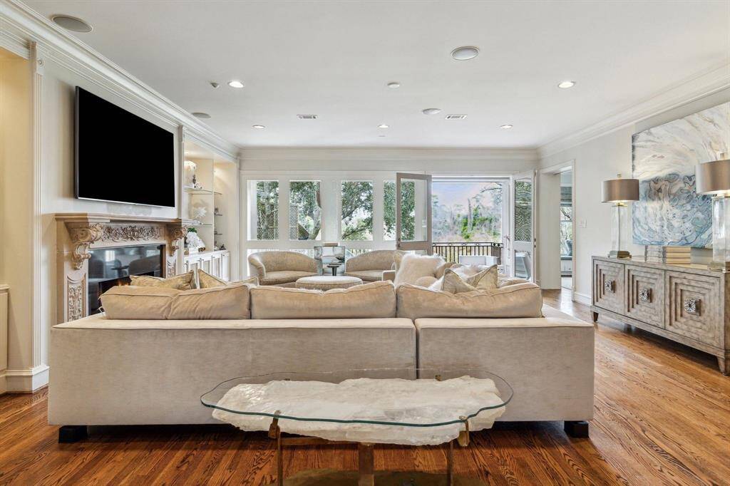 The thoughtful combination of classic design elements and modern touches makes this formal dining room a perfect blend of style and comfort, ideal for both intimate gatherings and elegant entertaining.