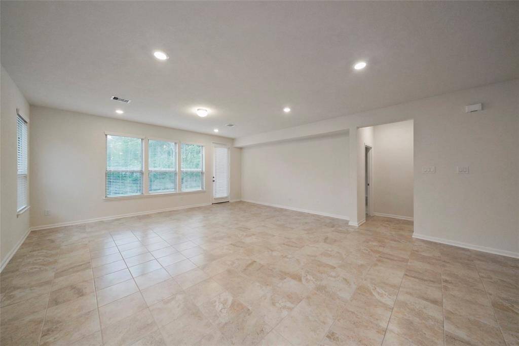 Expanded view of Great Room, seating area mainly.