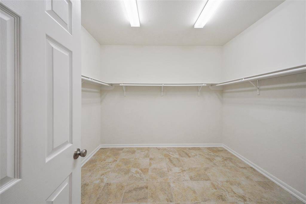 TRULY a Walk-In Closet for the Master & Mistress, PLENTY room for that Hi Maintenance Partner; no sub leasing this space out - even tho' its nearly bigger than my first Apartment at College. LOTS Space for LOTS Clothing!