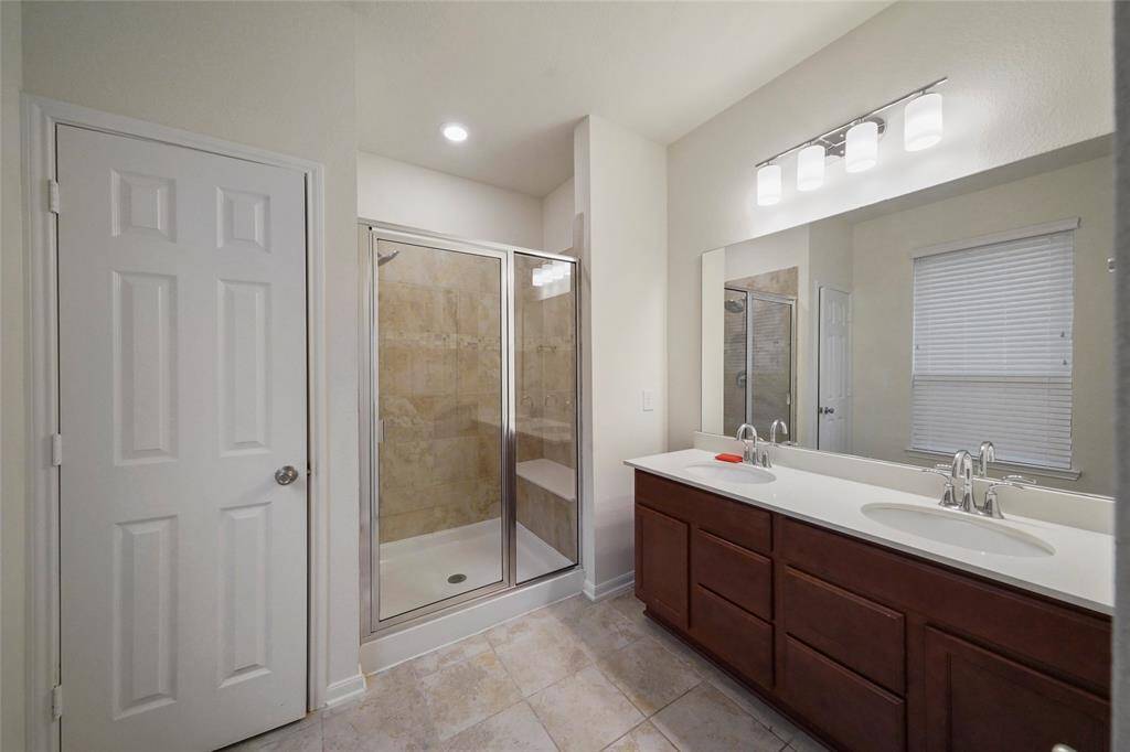 Clever fully functioning Master Bathroom, right off master bedroom. Shows true walk-in shower with large seat, double sinks, and WC in its own private room. 2nd closet for towels etc.