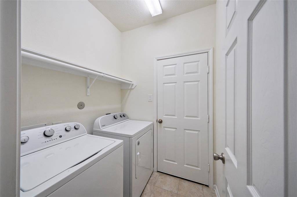 Nearly new full size electric Washer and Dryer in utility Room.  Its right off the 2nd Bedroom with bathroom ensuite - often for the girl or Mom in yr family and nicely close to this Utility Room