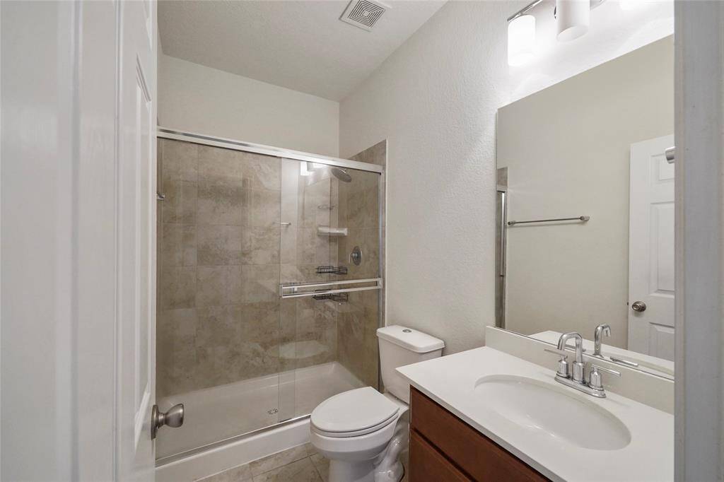 Full 3rd Bathroom, ensuite for this 4th Bedoom, Has glass wall sliding doors to ez step in tub and full shower. Oversize elongated toilet and Quartz sink finish off this luxury Bathroom - Dont you wish......NICE!