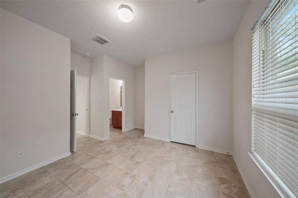 2nd view in 4th bedroom, looking back at full bathroom and Entrance.