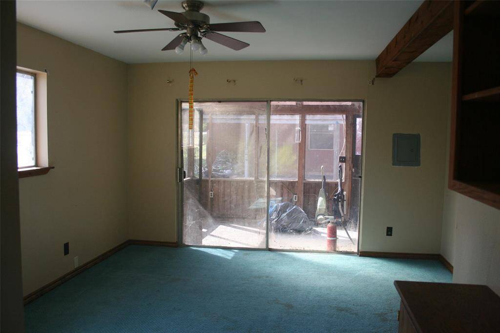 Bedroom 2 with access to screened in porch