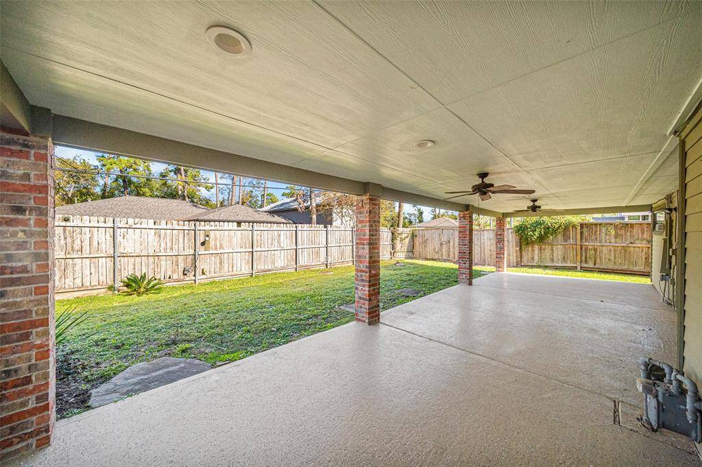 This expansive back patio is an entertainers dream! Able space for all your outdoor activities!