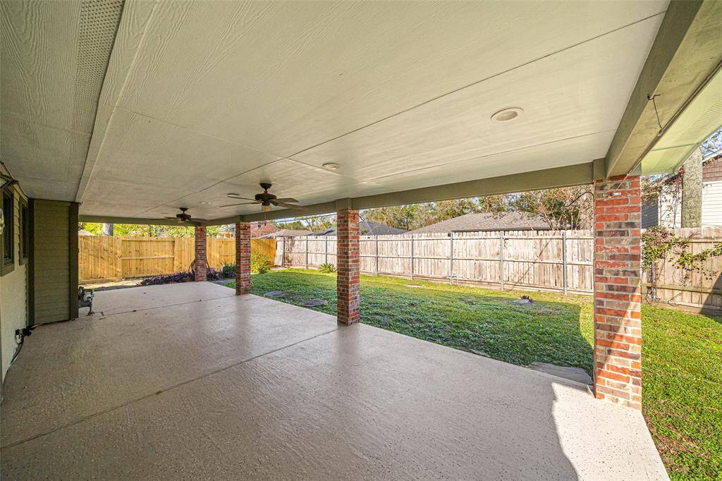 Additional view of the back patio. Enough room for outdoor furniture, grills, a sitting area or if you would like to dine al fresco.