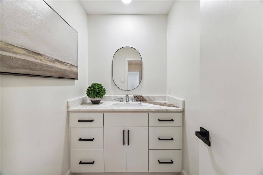 Upgraded bathroom vanities in all the bathrooms match the decor throughout the rest of the home.