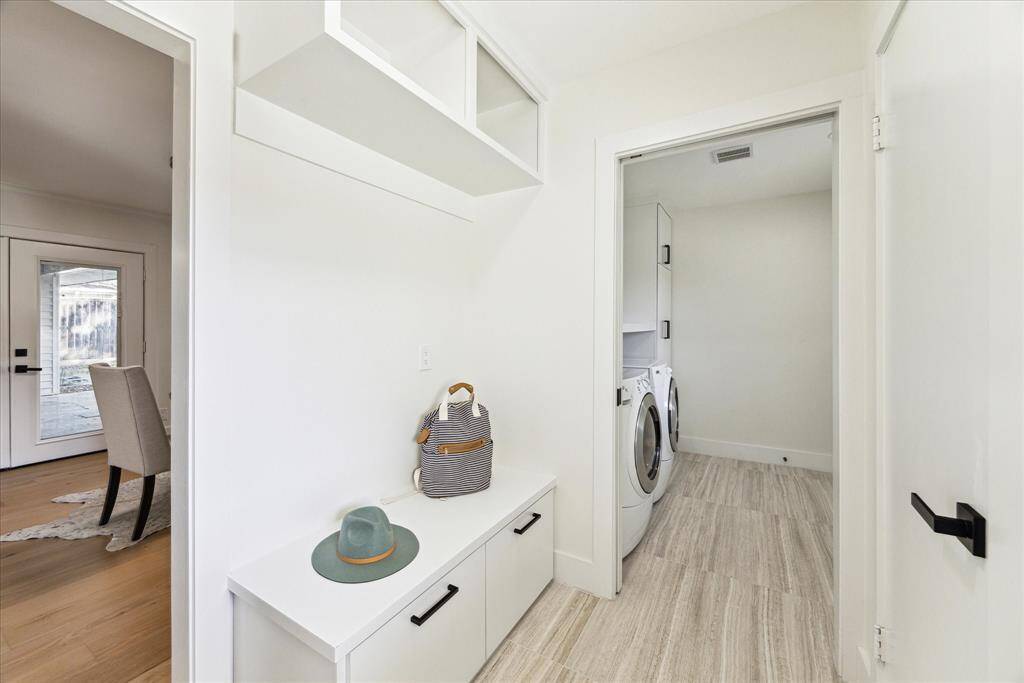 Mud room off garage and side door with lots of extra storage.