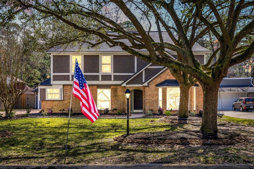 Night time view of 6527 Rippling Hollow Dr Spring, TX 77379