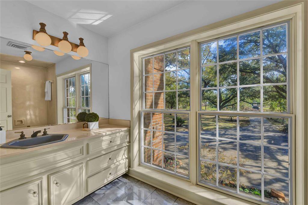 Charming bathroom with natural lighting.
