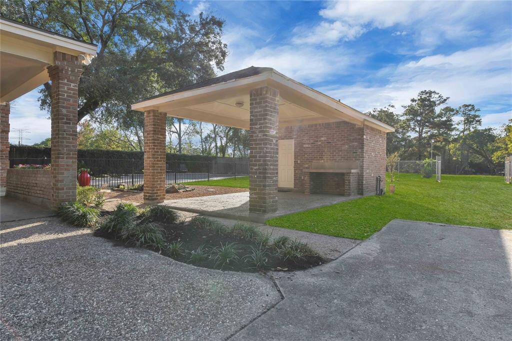Porch Area Close to Pool and Rear Entry