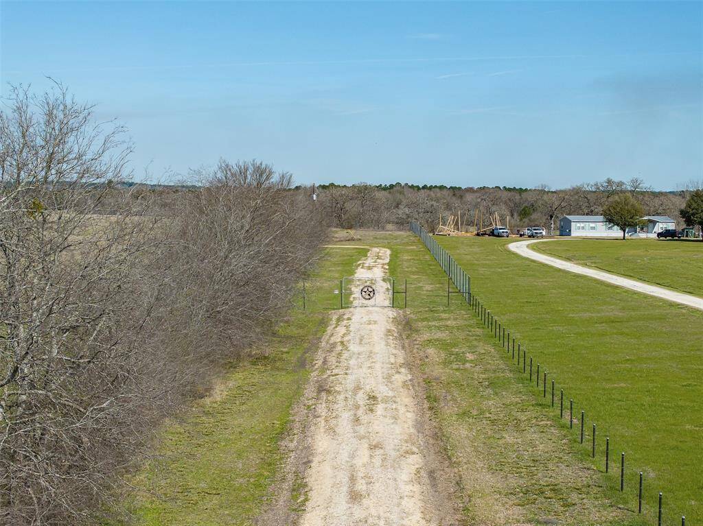 Well structured driveway leading up to a large game style gate, ready for your custom designed entrance!