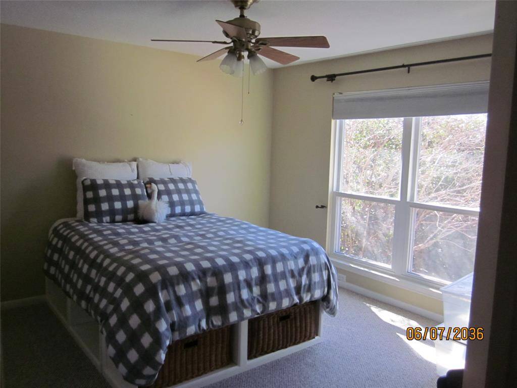 Secondar bathroom upstairs boasts double sinks and separate shower/toilet area