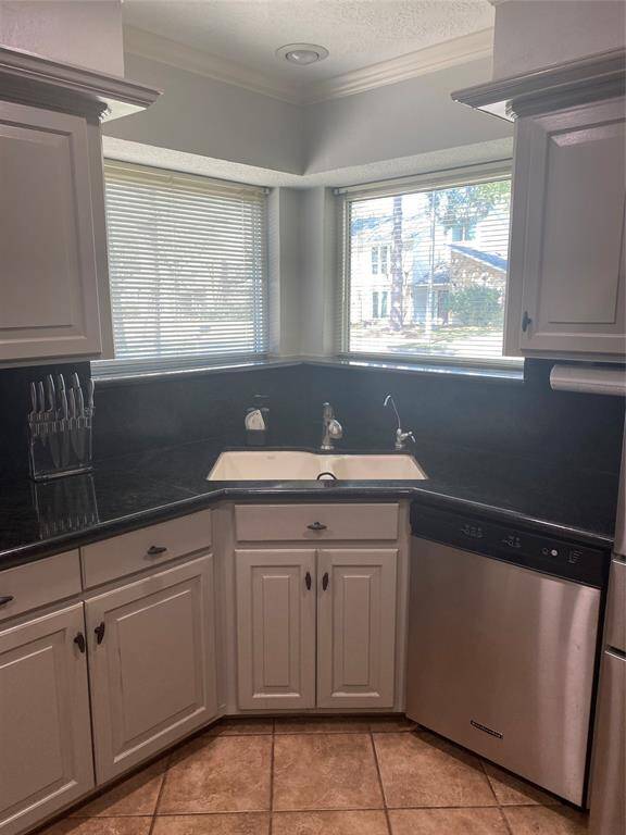 Kitchen window overlooks the street