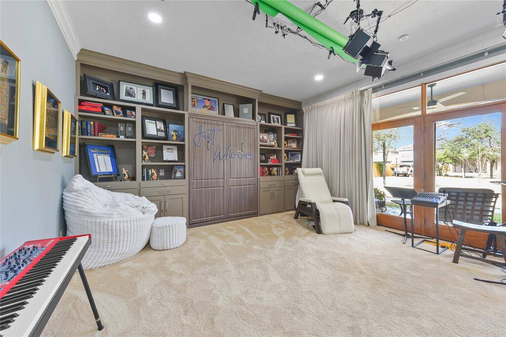 Quietly off of the main living area is this stylish, private, guest powder room half bath.
