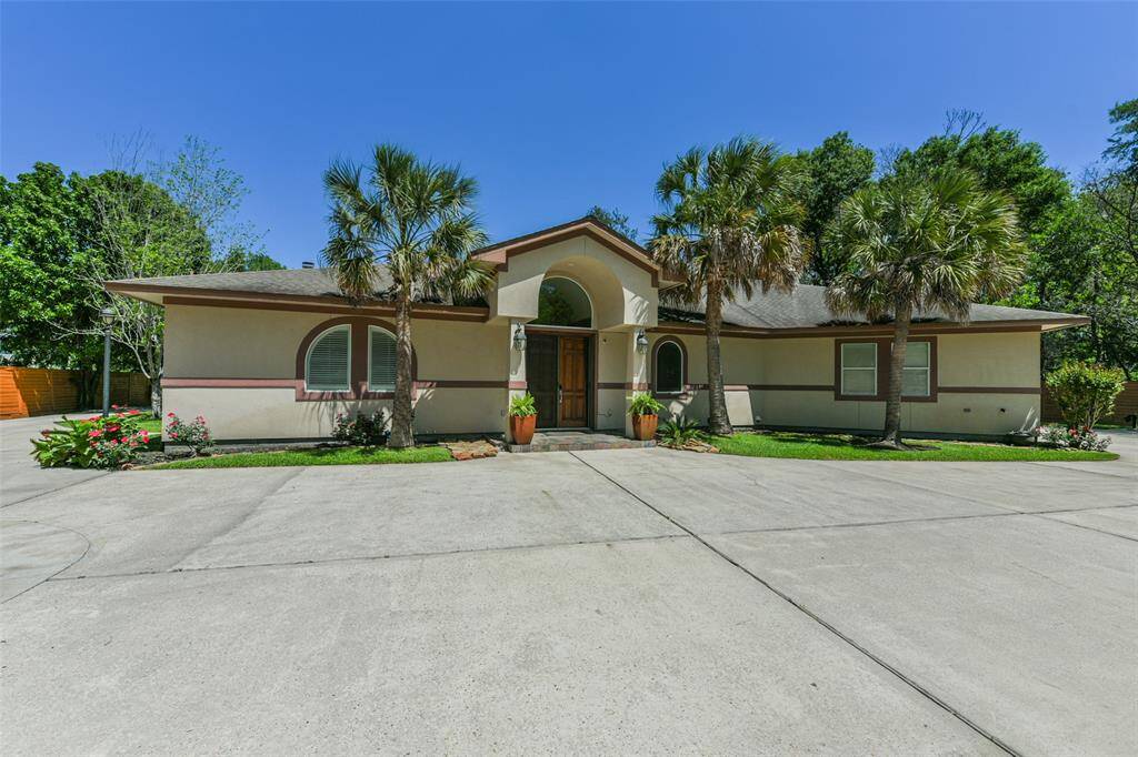 Welcome to a true oasis of peace within the big city! It's legal subdivision name is even "Villa de la Paz." This fabulous retreat consists of two 2000's era one level homes with currently a shared pool and pool house set on a fenced and gated 1.29 acres of land.