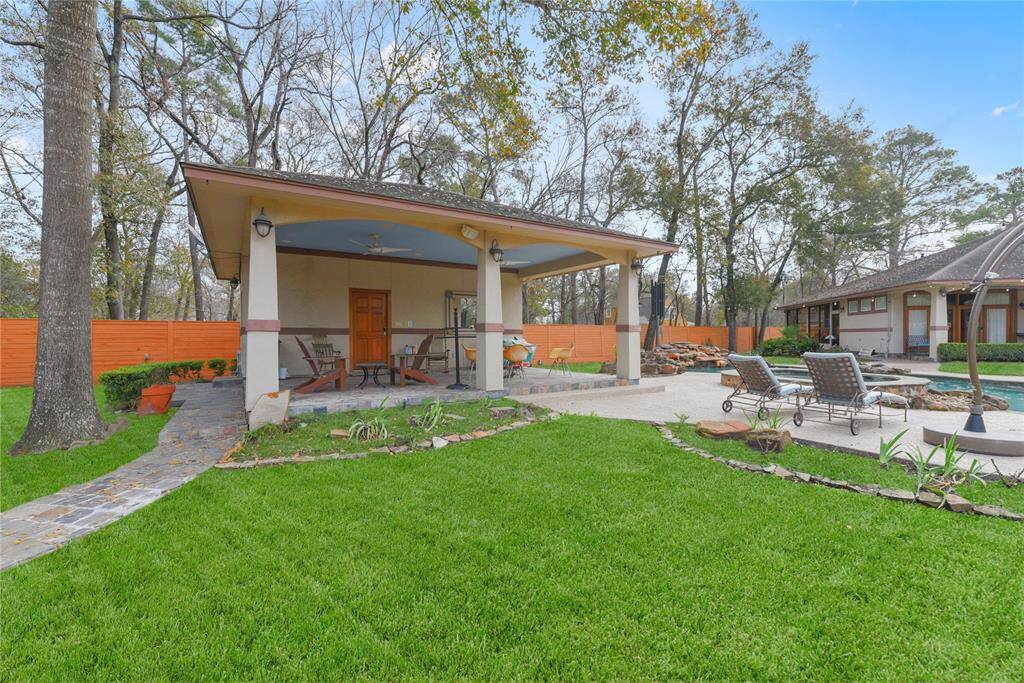 Very useful as a pool house changing area and even a guest suite, this charming pool house is a super amenity!  It consists of a large one room suite with full bath, laundry facilities and walk-in closet.
