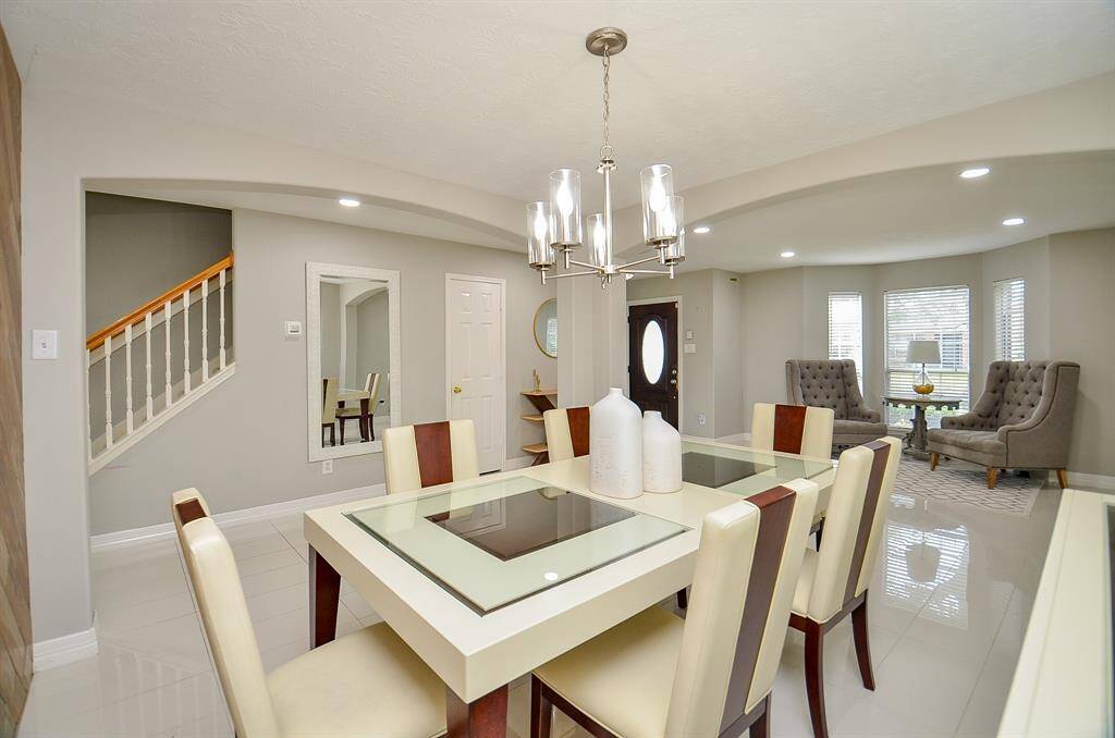 The spacious dining area is perfect for hosting memorable dinners and gatherings.