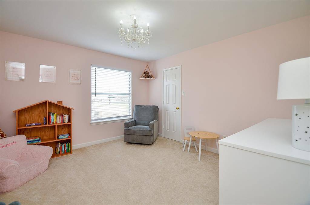 This delightful space is perfectly suited for a child's playroom or nursery.