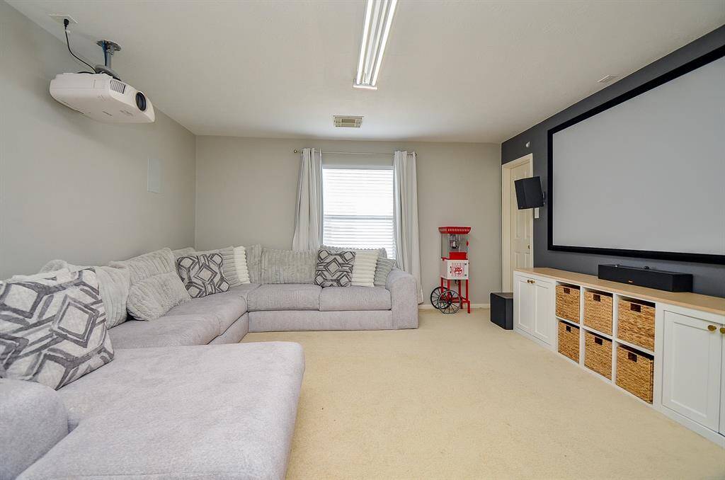 This home theater room combines functionality and style.