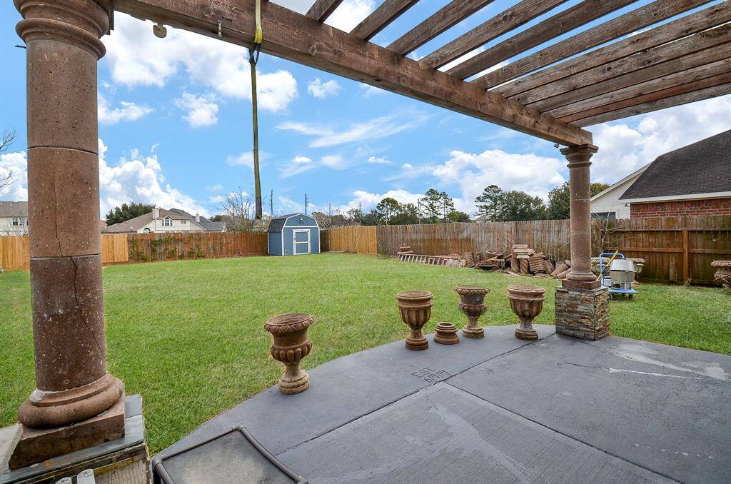 This beautifully landscaped backyard is the perfect retreat for relaxation and entertainment