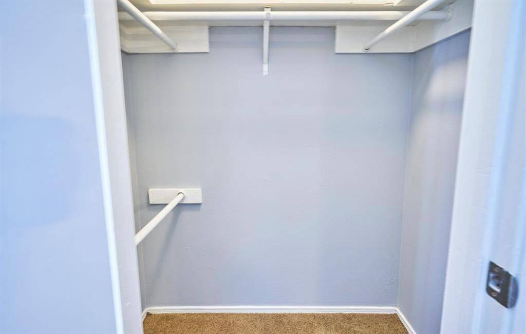 Second of two master bedroom closets