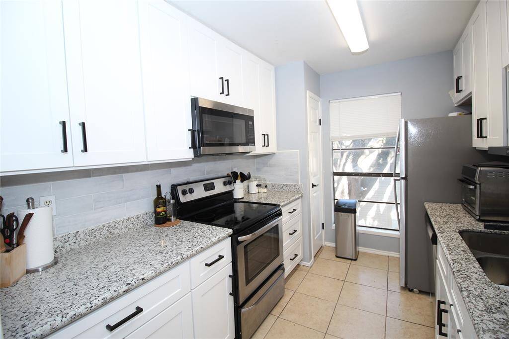 Kitchen with brand new cabinets and granite countertop