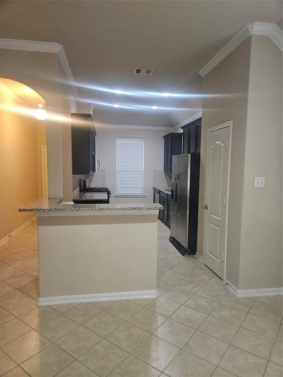 Spacious Kitchen with Breakfast Bar View