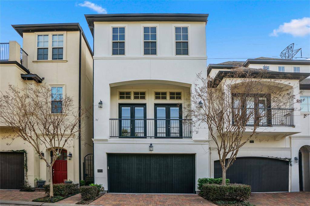 Welcome to 10913 Upland Park in a boutique gated community in Spring Branch. Double French doors on the second floor covered balcony overlooks the community lake and water feature. No front or back neighbors.