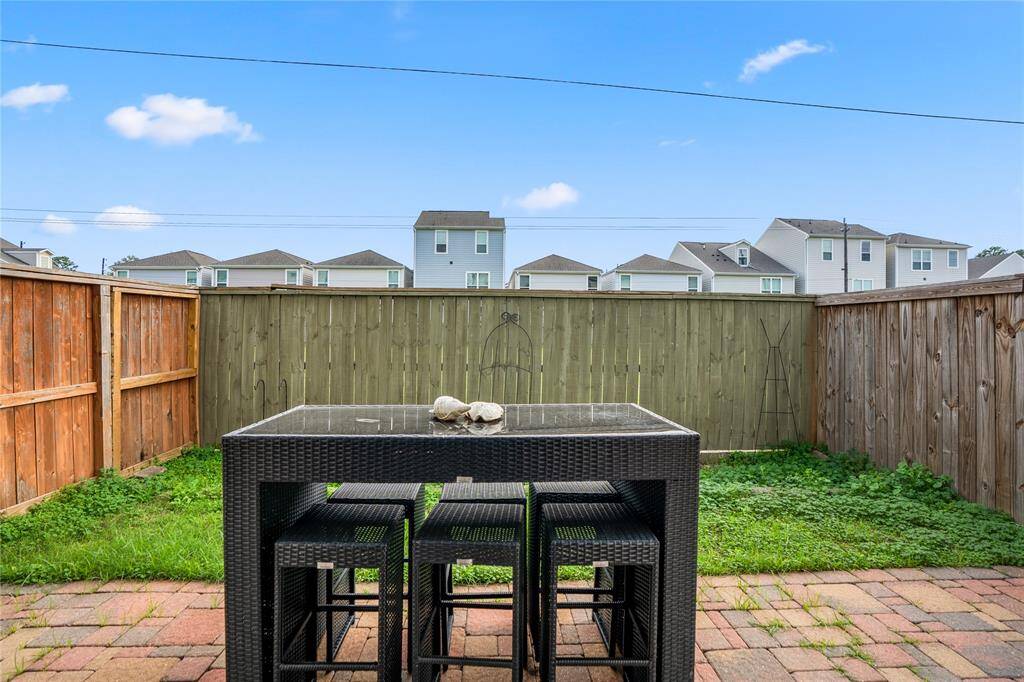 Welcome to your adorable and manageable backyard! Notice NO immediate back neighbors. Just a green space.